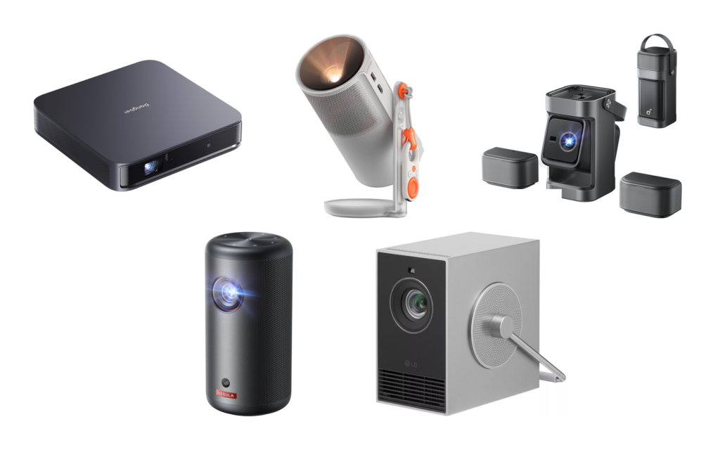 Five portable projectors on a white background: a flat dark gray Dangbei Atom, a white XGIMI MoGo 4 on its stand, a gray Nebula P1 with its two speakers detached, a black cylindrical Nebula Capsule 3, and a silver LG CineBeam Q with its handle.